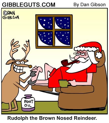 Rudolph rubs Santa's feet with Foot Oll, he has a brown nose