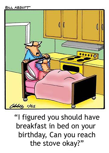 Old man wheels his ailing wife into the kitchen by the stove so that she can make her own birthday breakfast.