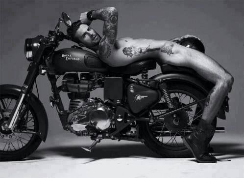 Adam Levine on a motorcycle