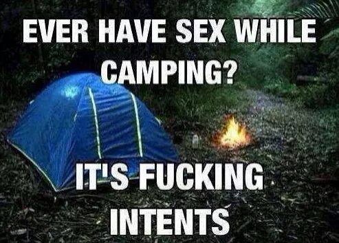 Camping outdoors as a couple, kind of in tents, a funny photo.