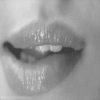 animated woman's lips biting each other