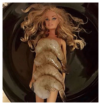 Funny photo of Barbie with 4 raw shrimg covering her body