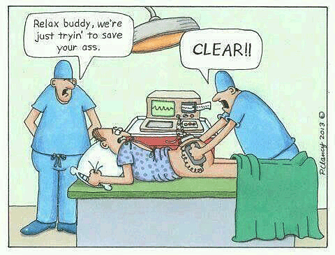 A funny cartoon of a medical team using shock treatment.