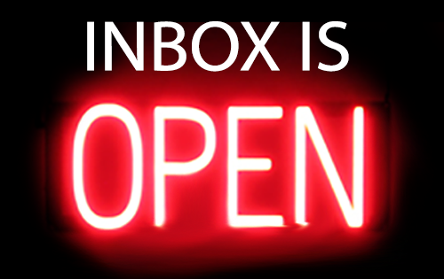 Inbox is Open neon sign. Would like to hear from you.