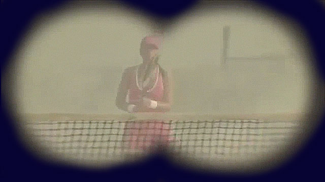 Woman with tennis racket keeps hitting large shells being shot at her in a spoof war scene.