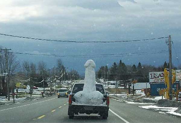 unusual snow sculpture in a truck