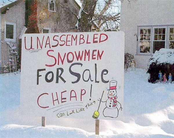 Sign in a yard selling UNasssembled snowmen for sale Cheap. A way to get people to scoop up their snow so they don't have to do it.